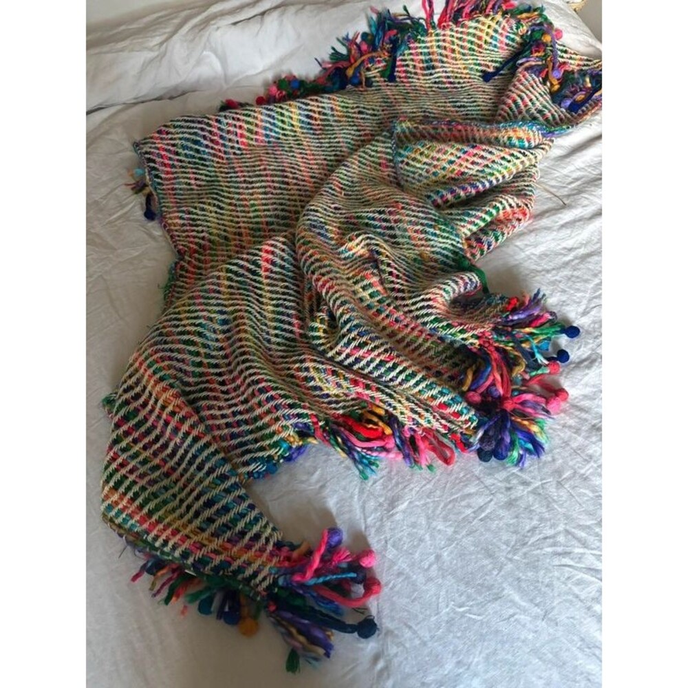Colorful woven throw blanket with tassels/fringe